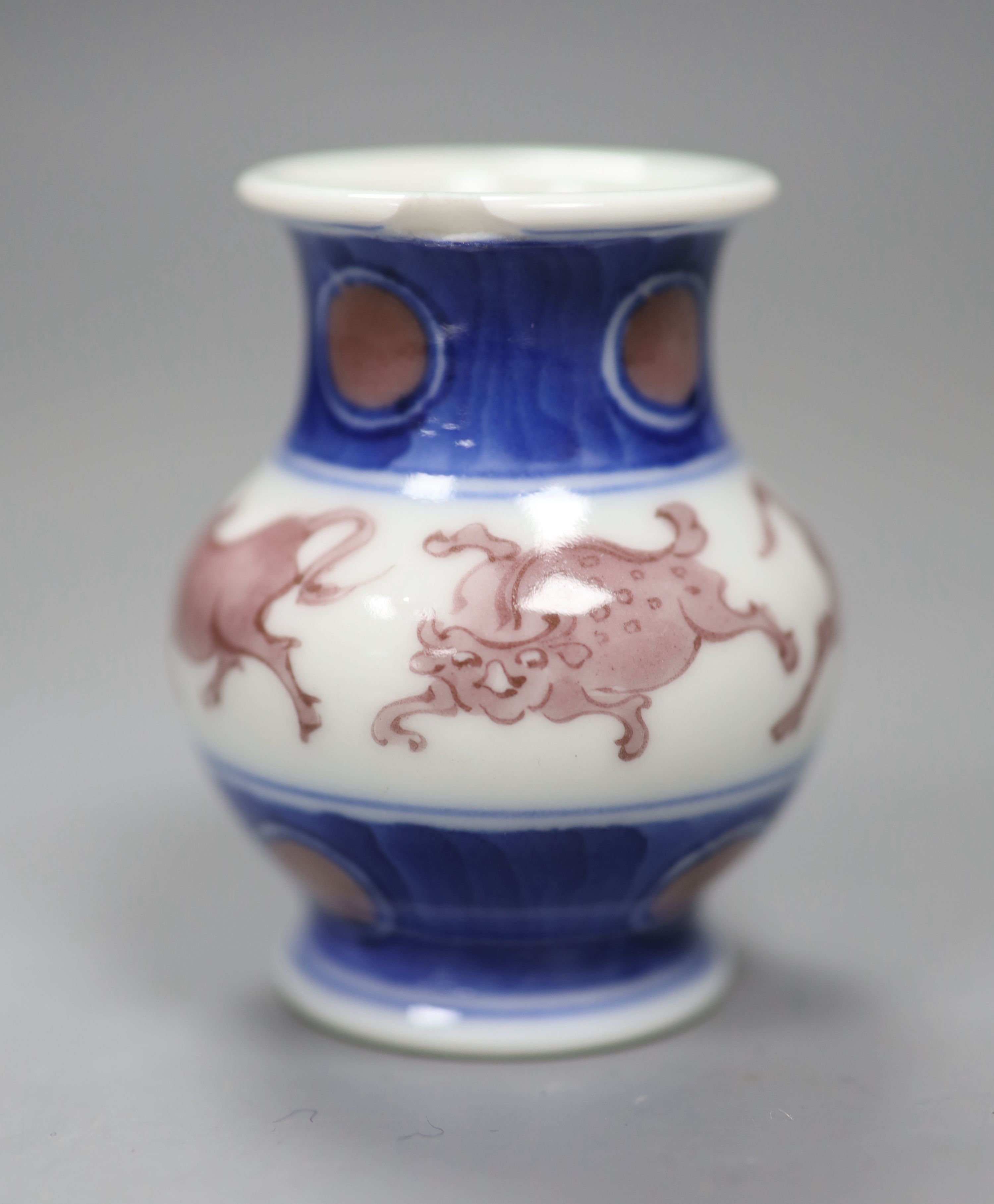 Makuzu Kozan. An underglaze blue and copper red small jar, height 6.5cm